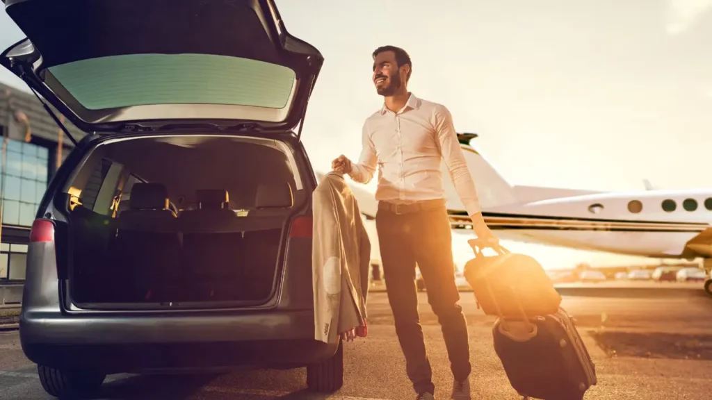 Car Rental vs. Car Delivery Services: Which One Fits Your Lifestyle and Budget Better? 4 a businessman going for a car rental at airport