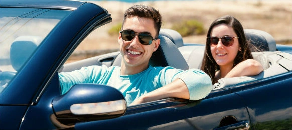 couple ready for their road trip dp So whether you’re grabbing the keys from Mr. Rent A Car or another local rental service, here are five easy, practical safety tips that every driver should know before they hit the open road.