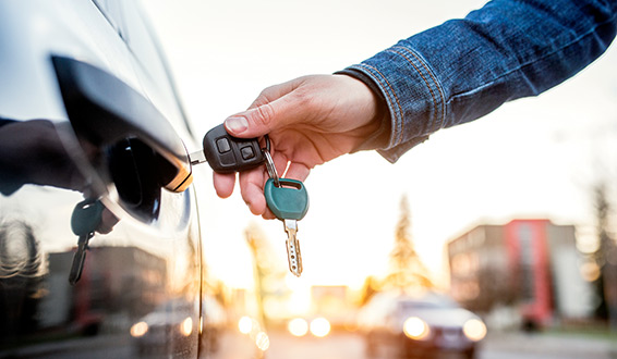 a man entering into a car rental like flexcar