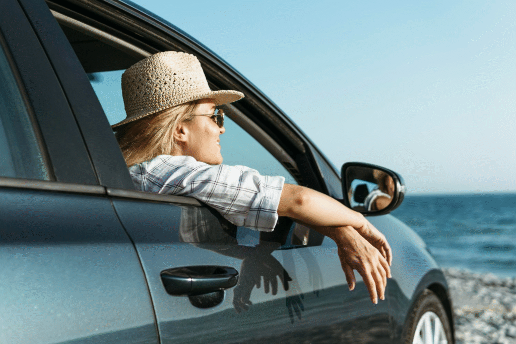 A woman enjoying car rental like zoomcar