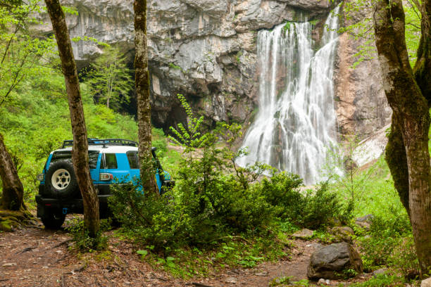 a car near a waterfall in Vancouver