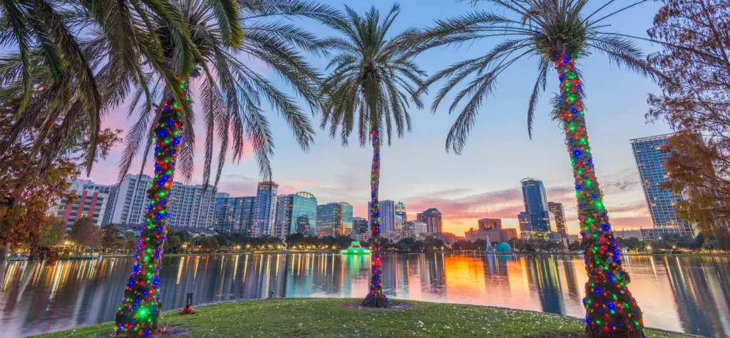 Image Orlando Florida downtown skyline at Eola Lak Orlando is one of those cities that means something different to everyone. For families, it’s the gateway to Disney magic and unforgettable days at Universal Studios. For business travelers, it’s a bustling hub of conferences, meetings, and networking at the massive Orange County Convention Center. No matter what brings you here, there’s one thing everyone quickly realizes—getting around is so much easier when you have the best car rental in Orlando.