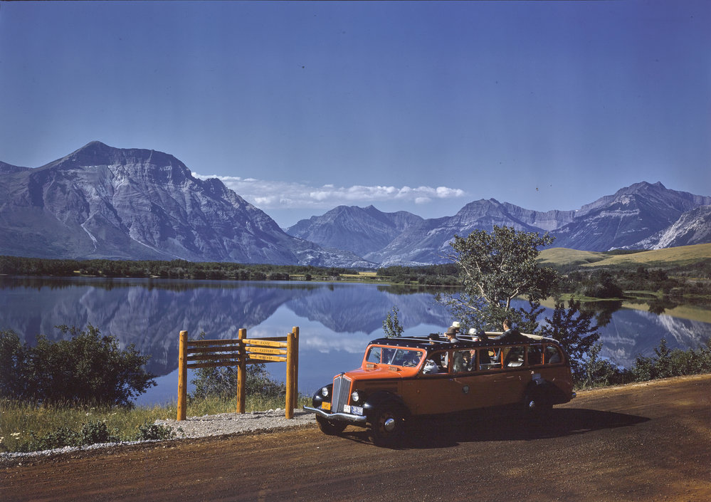 A family car along with a beautiful Lake in Waterlon
